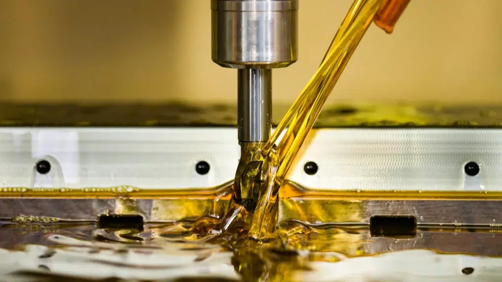 Oil poured onto a milling machine