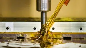Oil poured onto a milling machine