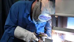 Millwright fabricating a custom installation