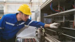 Millwright working with a geared machine